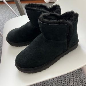 Uggs. They don't make these anymore. They are like the mini. Never worn. Size 10